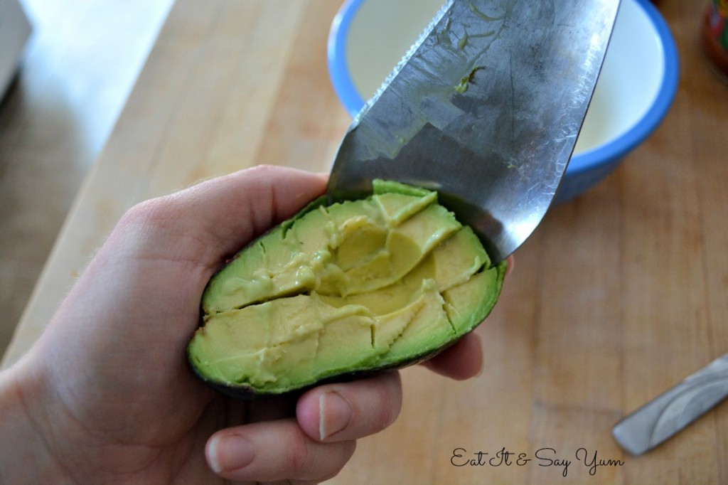 scraping out the avocado 351