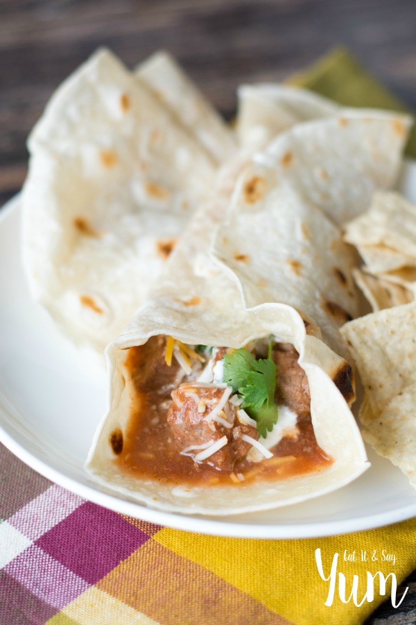 Chile Colorado made in the crockpot then wrapped up in a tortilla, easy dinner that cooks all day- great smoky flavor!